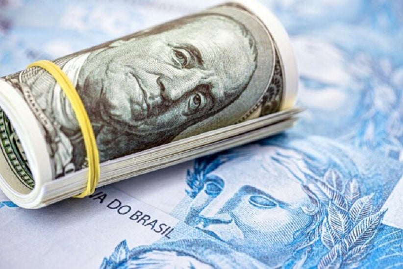 Dólar e Real - Foto: iStock